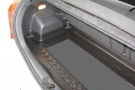 Toyota Yaris 2005 t/m 2011 (hoge gedeelte, met flappen) - Guardliner Kofferbakmat
